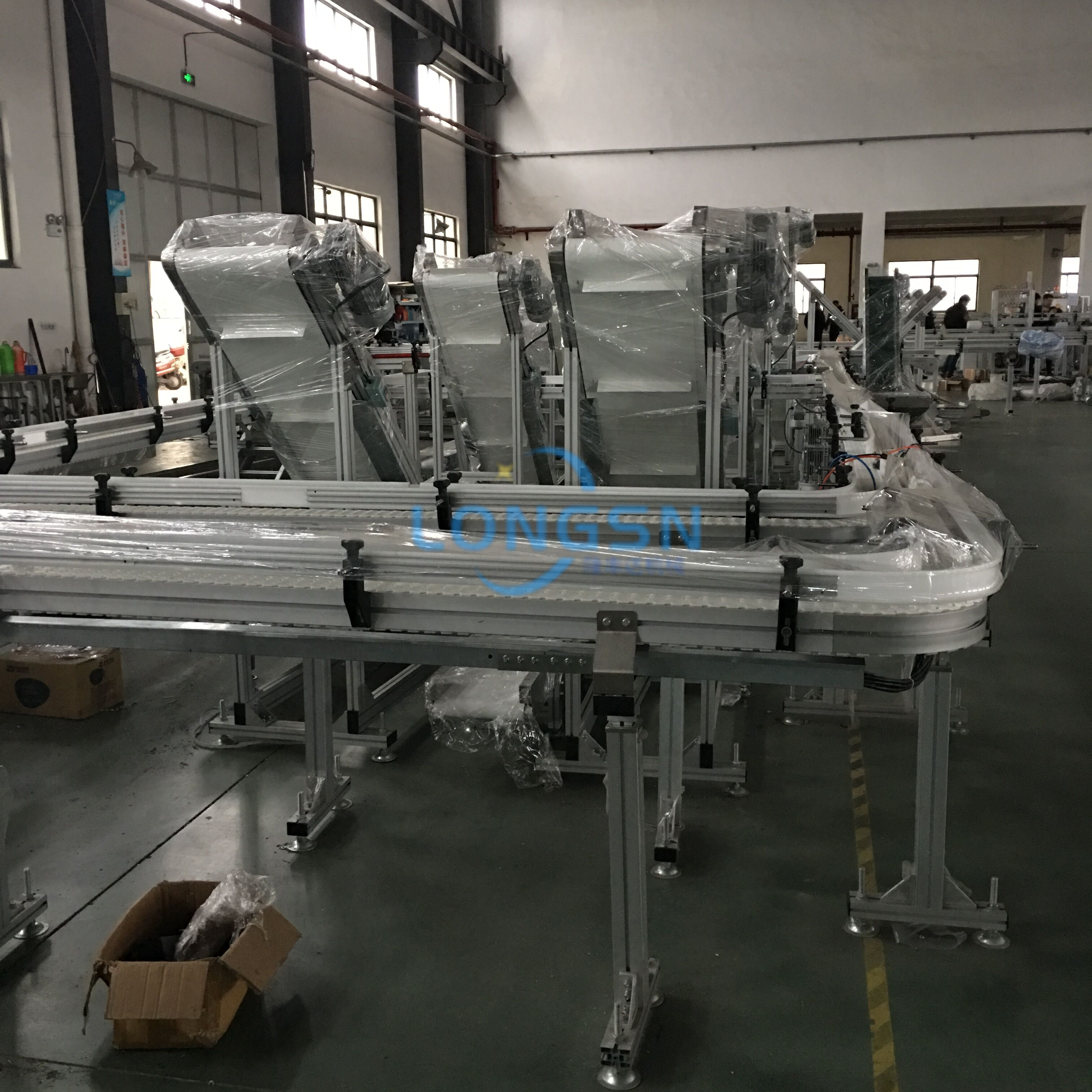 sistema de transporte de botellas