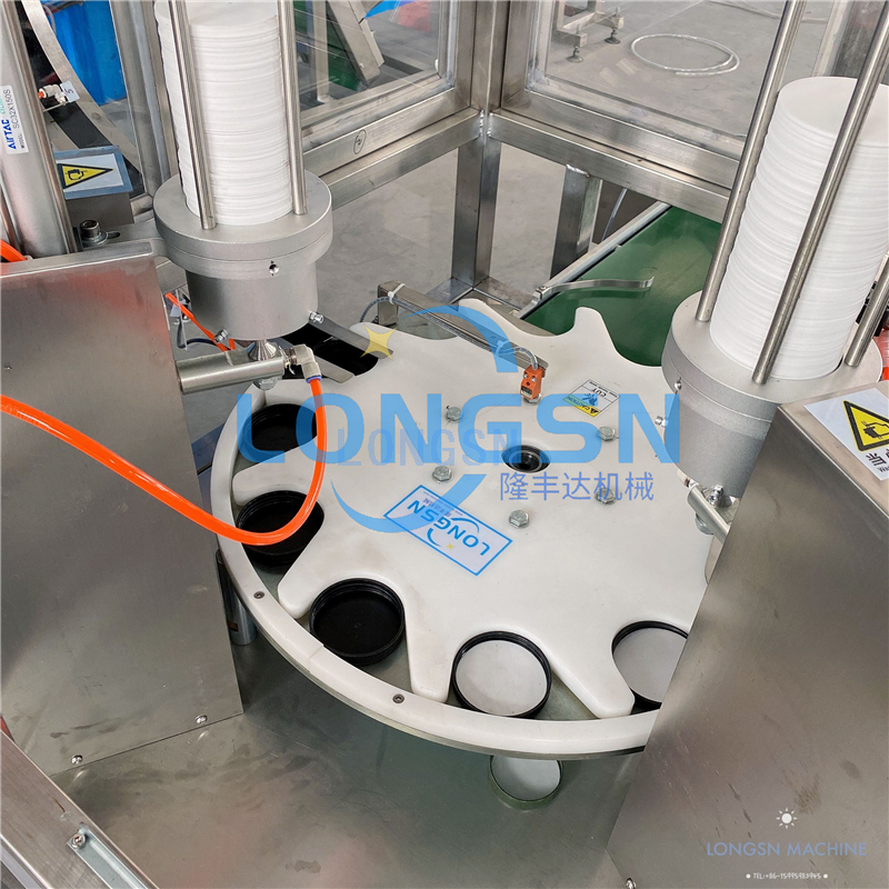 M&aacute;quina de inserci&oacute;n de forro de tapa