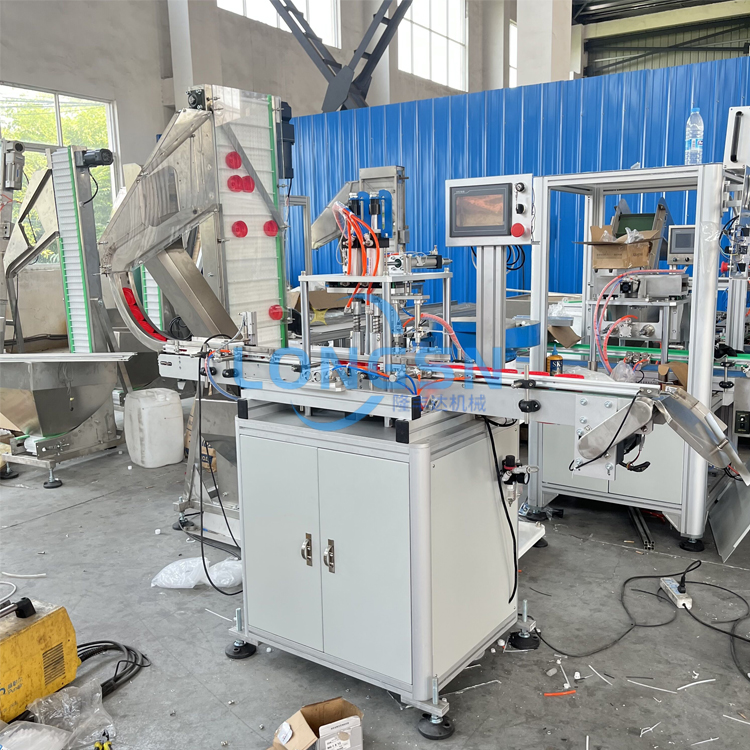 m&aacute;quina de ensamblaje de tapa de pl&aacute;stico