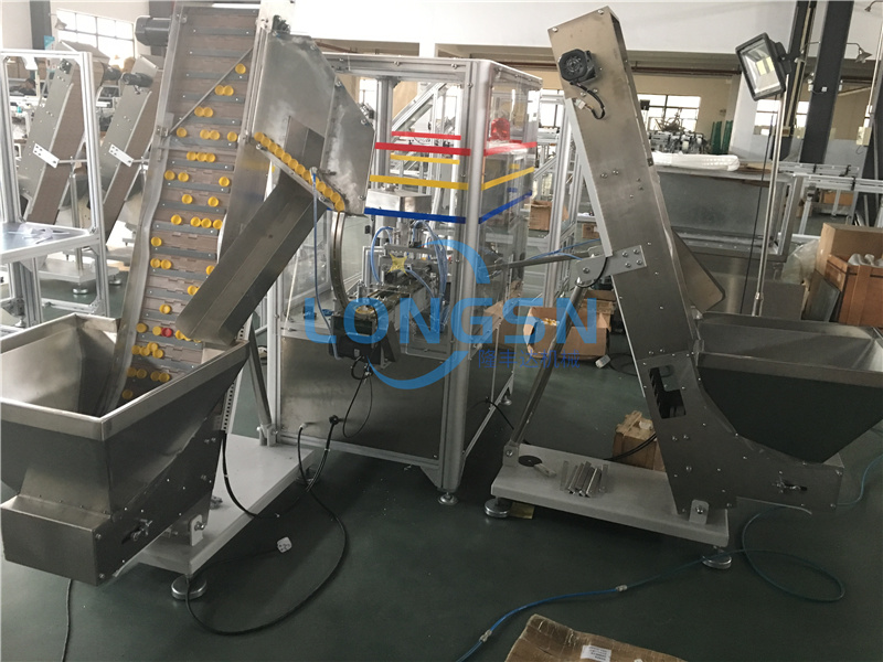 m&aacute;quina de ensamblaje de tapa de aceite