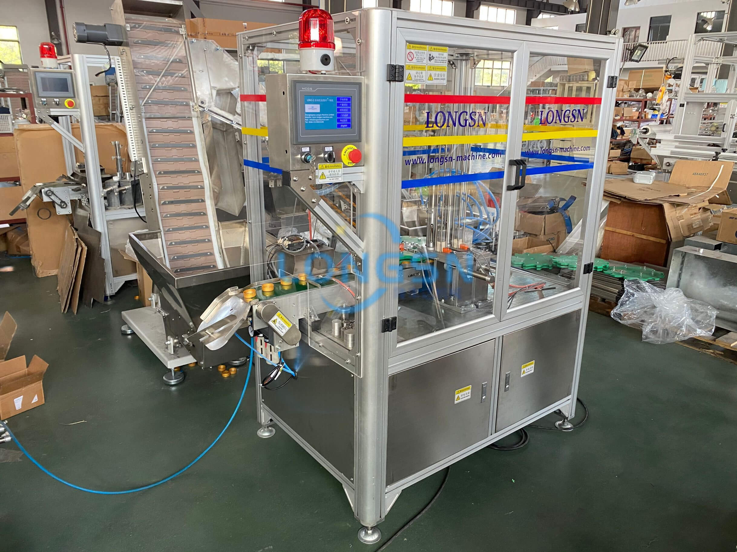 m&aacute;quina de ensamblaje del revestimiento de la tapa